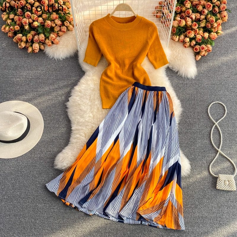 Cap Point Brigitte Two Piece Set O-neck Short Sleeve Knit Top Print Pleated Skirt